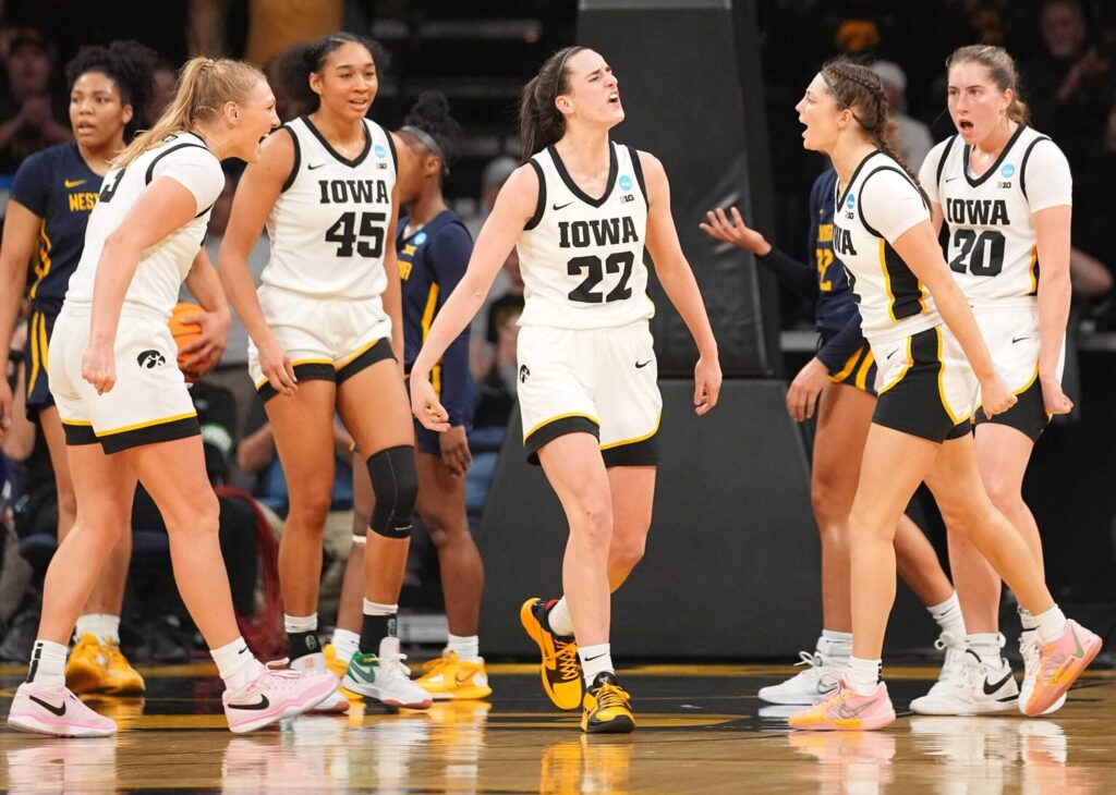 Caitlin Clark, Iowa survive West Virginia’s upset attempt as Hawkeyes star breaks another record