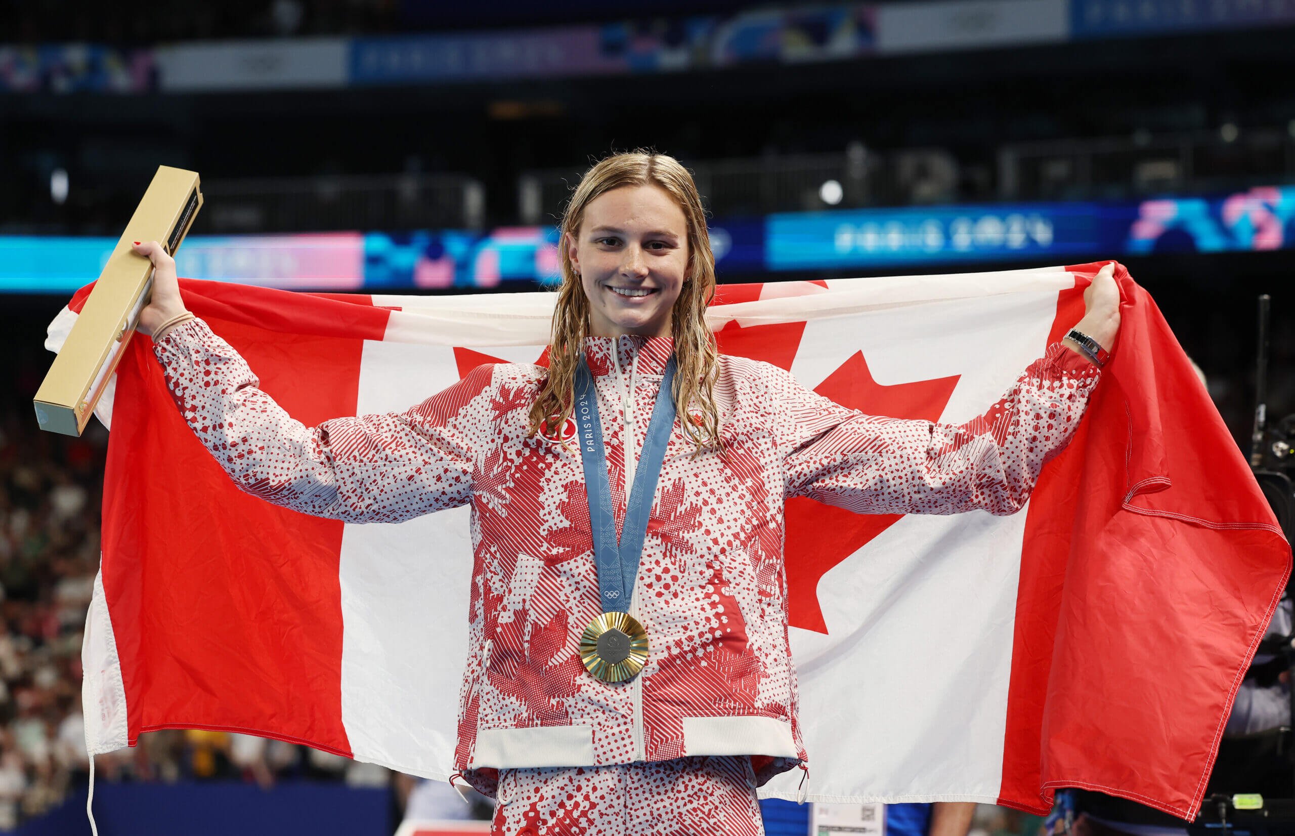 Canadian teenage star Summer McIntosh sets Olympic record, wins gold in 200-meter butterfly
