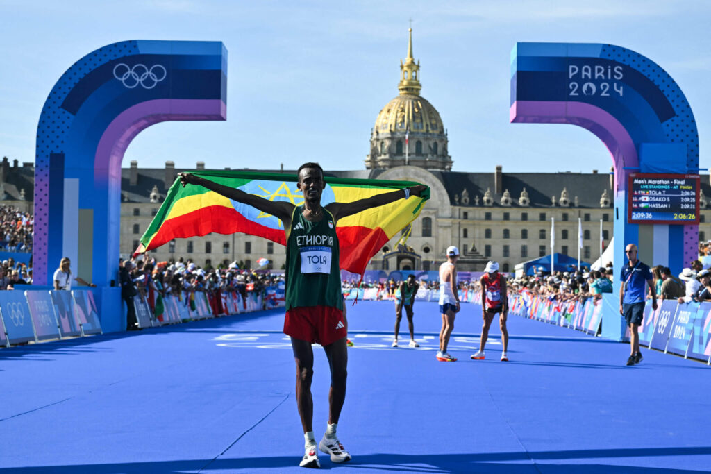 Tamirat Tola wins captivating Olympic marathon for Ethiopia