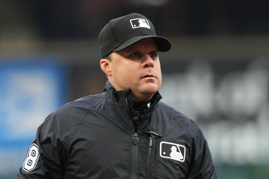 Umpire hit in head by Giancarlo Stanton’s broken bat, carted off field